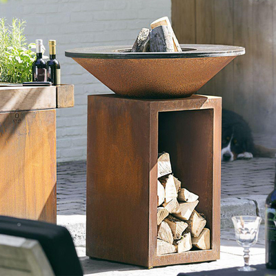 Le feu en acier rouillé Pit Outdoor With Wood Storage de la taille 100cm Corten
