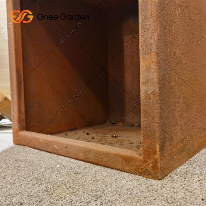 La cuisson extérieure grille le feu en acier Pit With de Corten que le revêtement de rouille de gril de BARBECUE mangent dehors